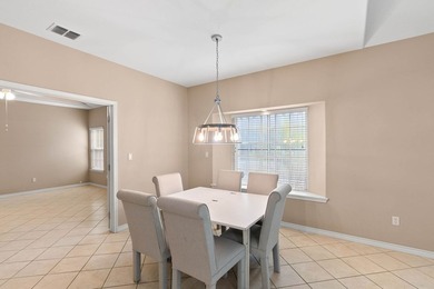 Designed with an attractive open-concept floor plan, the - photo 8