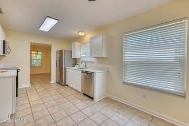 Welcome home! This 3-bedroom, 2-bathroom home offers features - photo 9