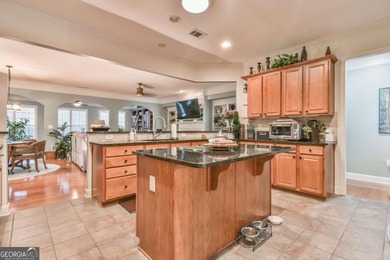This well-maintained and beautifully kept home features the - photo 14