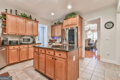This well-maintained and beautifully kept home features the - photo 15