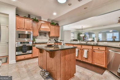 This well-maintained and beautifully kept home features the - photo 16