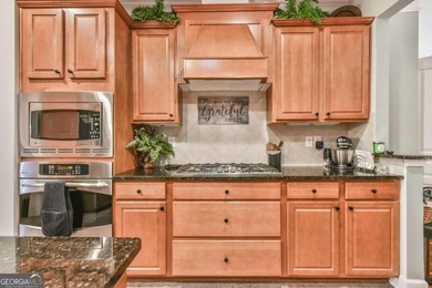 This well-maintained and beautifully kept home features the - photo 17