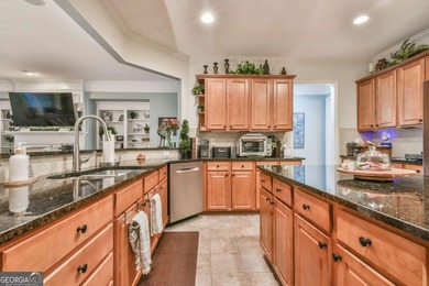 This well-maintained and beautifully kept home features the - photo 18