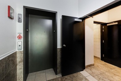 Spacious 3 bed 2 bath extra wide condo with elevator access and - photo 3