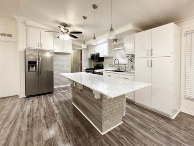 Freshly painted 3 bed, 2 bath home with new appliances and open - photo 9