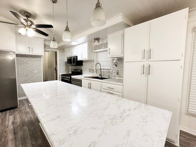 Freshly painted 3 bed, 2 bath home with new appliances and open - photo 10