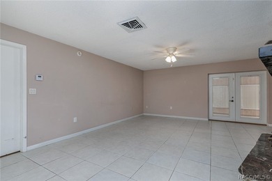 NICE 3/2/2 CONCRETE BLOCK HOME ON .47 ACRE MOL DOUBLE LOT - photo 2