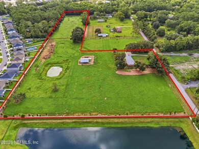Discover a rare 10.6-acre estate offering the flexibility to - photo 1