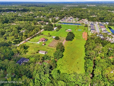 Discover a rare 10.6-acre estate offering the flexibility to - photo 4
