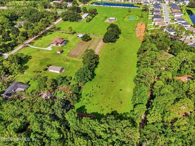 Discover a rare 10.6-acre estate offering the flexibility to - photo 5