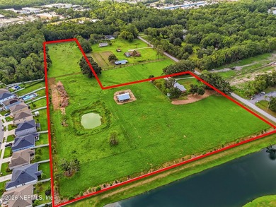 Discover a rare 10.6-acre estate offering the flexibility to - photo 8