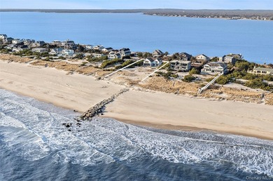 Set along coveted Dune Road, this jetty-protected oceanfront - photo 2