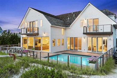 Set along coveted Dune Road, this jetty-protected oceanfront - photo 4