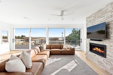 Set along coveted Dune Road, this jetty-protected oceanfront - photo 7