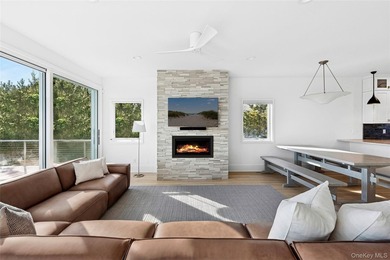 Set along coveted Dune Road, this jetty-protected oceanfront - photo 8