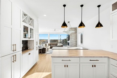 Set along coveted Dune Road, this jetty-protected oceanfront - photo 9