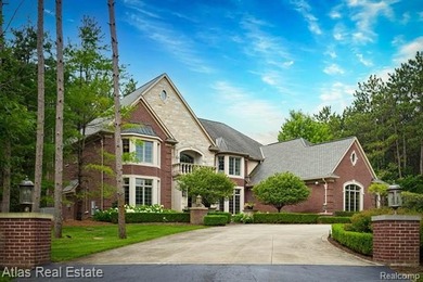 Enter the private estate through a gated front entrance and pass - photo 1