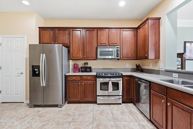 Upgraded townhome with a rare attached two-car garage, open - photo 3