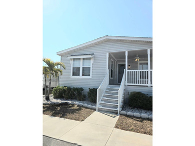 This Beautiful MOVE IN READY 2022 Jacobsen 2 Bed 2 Bath Home is - photo 3