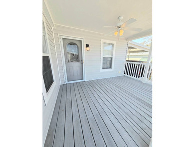 This Beautiful MOVE IN READY 2022 Jacobsen 2 Bed 2 Bath Home is - photo 4