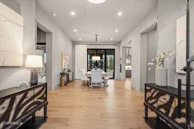 Completed in 2025, this custom home in Desert Ranch offers - photo 5