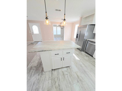 This Beautiful MOVE IN READY 2022 Jacobsen 2 Bed 2 Bath Home is - photo 7