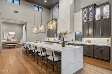 Completed in 2025, this custom home in Desert Ranch offers - photo 9