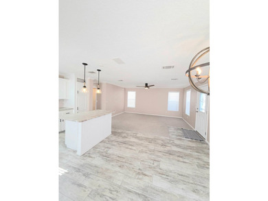 This Beautiful MOVE IN READY 2022 Jacobsen 2 Bed 2 Bath Home is - photo 9