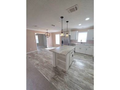 This Beautiful MOVE IN READY 2022 Jacobsen 2 Bed 2 Bath Home is - photo 10