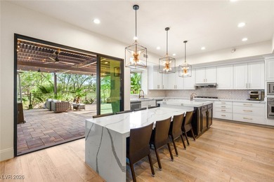 Situated on a premier lot in The Palisades at Summerlin, this