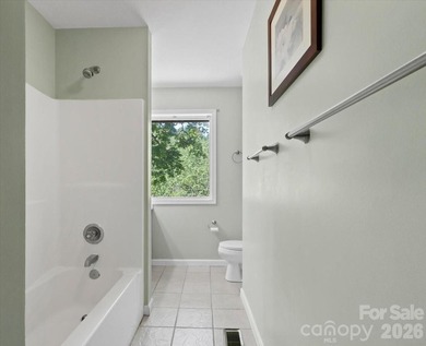 Escape to this warm and inviting 1.5-story mountain home set on - photo 12