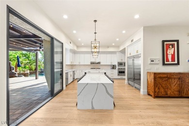 Situated on a premier lot in The Palisades at Summerlin, this