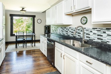 Four bedrooms, two baths, and 1,473 square feet with an open - photo 13