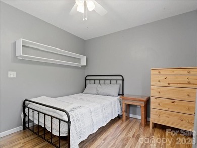 Escape to this warm and inviting 1.5-story mountain home set on - photo 14