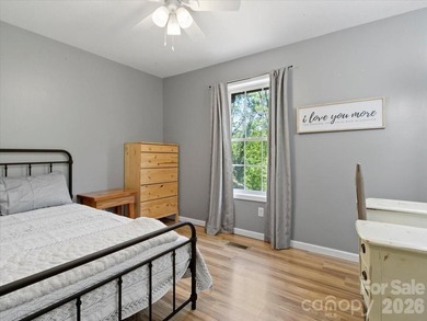 Escape to this warm and inviting 1.5-story mountain home set on - photo 15