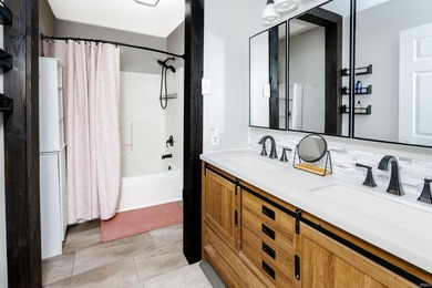 Four bedrooms, two baths, and 1,473 square feet with an open - photo 17