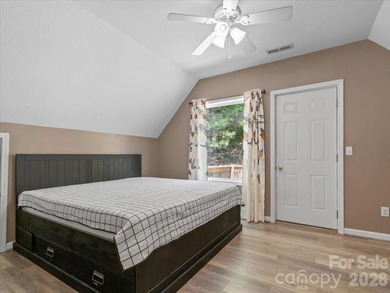 Escape to this warm and inviting 1.5-story mountain home set on - photo 19