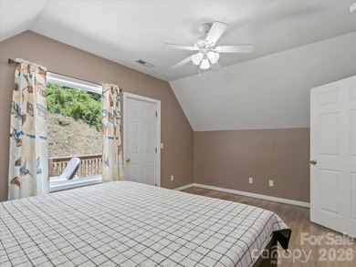 Escape to this warm and inviting 1.5-story mountain home set on - photo 20