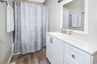 Four bedrooms, two baths, and 1,473 square feet with an open - photo 21