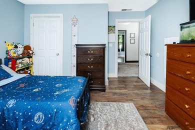 Four bedrooms, two baths, and 1,473 square feet with an open - photo 25