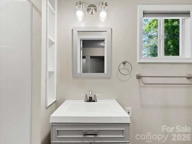 Escape to this warm and inviting 1.5-story mountain home set on - photo 32