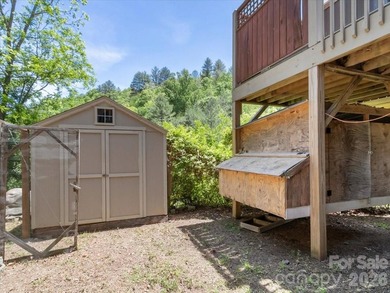 Escape to this warm and inviting 1.5-story mountain home set on - photo 35