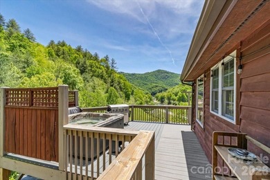 Escape to this warm and inviting 1.5-story mountain home set on - photo 36