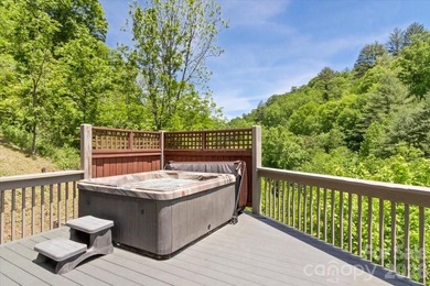 Escape to this warm and inviting 1.5-story mountain home set on - photo 38