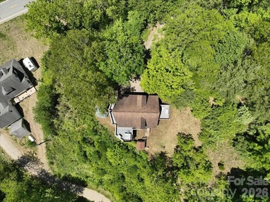 Escape to this warm and inviting 1.5-story mountain home set on - photo 41