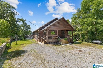 Beautiful waterfront log cabin offering 3 bedrooms, 2.5 - photo 2