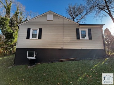 Welcome to 1303 Oakgrove Ave, a beautifully updated 3-bedroom