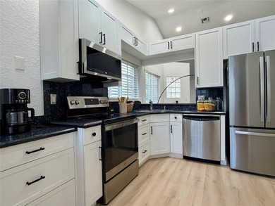All ages Updated 2BR/2BA corner condo with the feel of a - photo 6