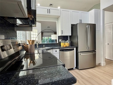All ages Updated 2BR/2BA corner condo with the feel of a - photo 10