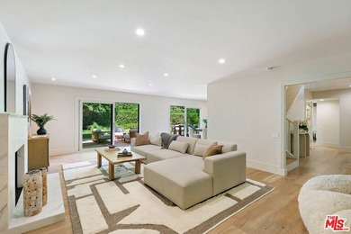 Nestled on a rare private flat lot along Sicomoro Drive in the - photo 4